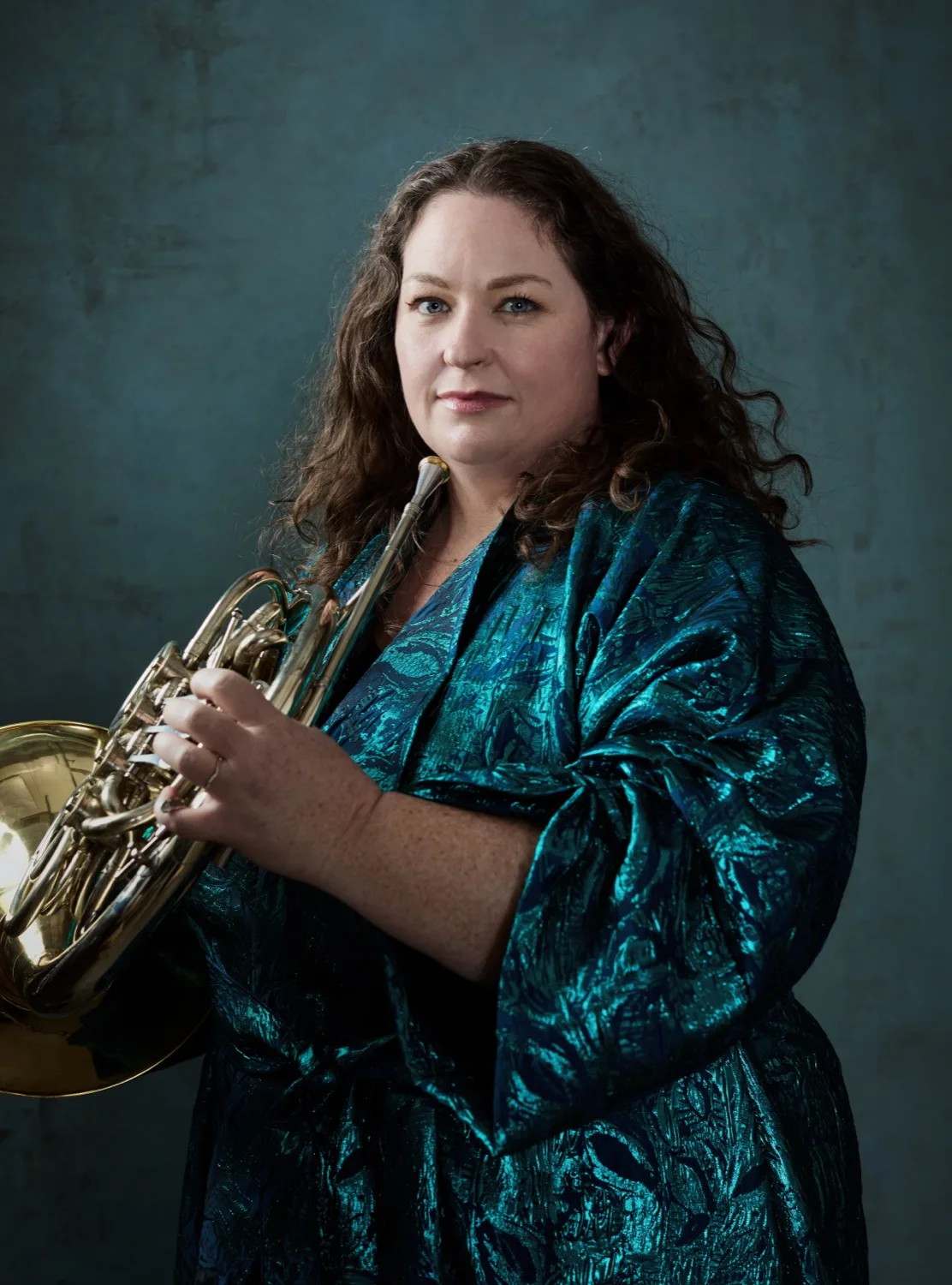 Megan Cullen holding her horn