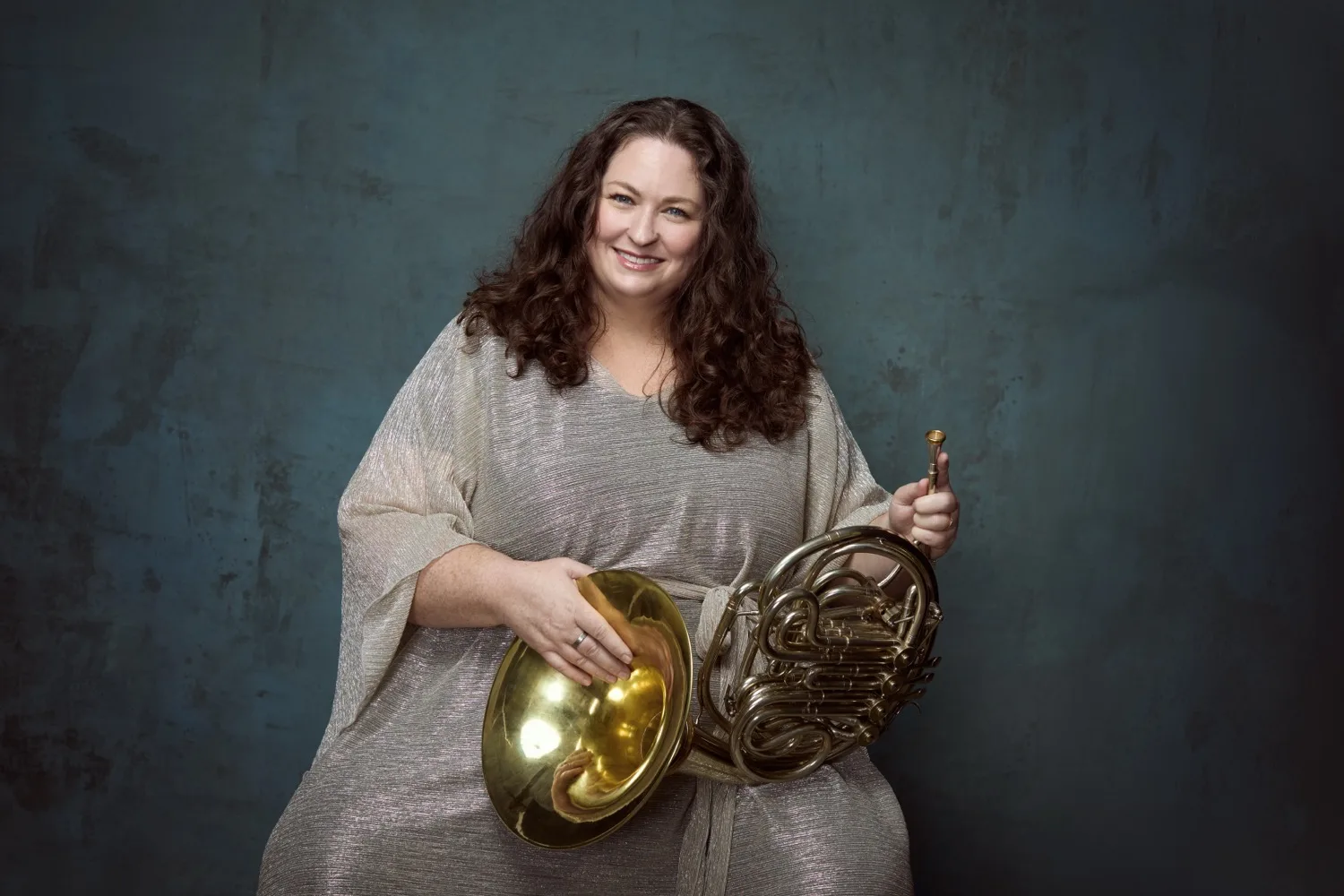 Megan Cullen playing with the bell of the horn raised