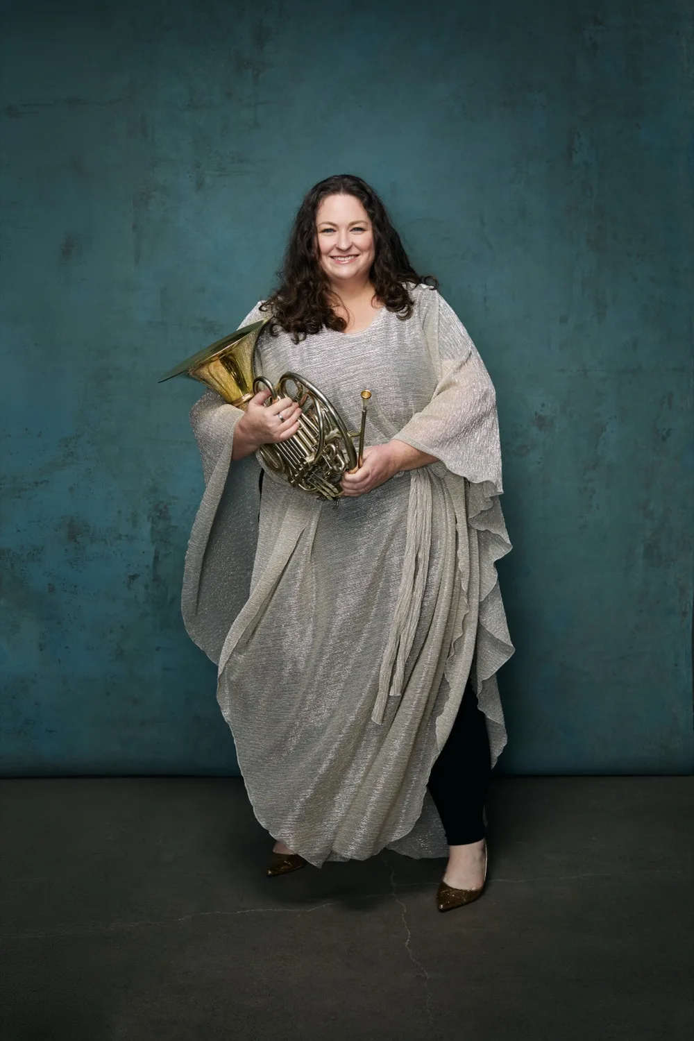 Megan Cullen with her horn, draped pose